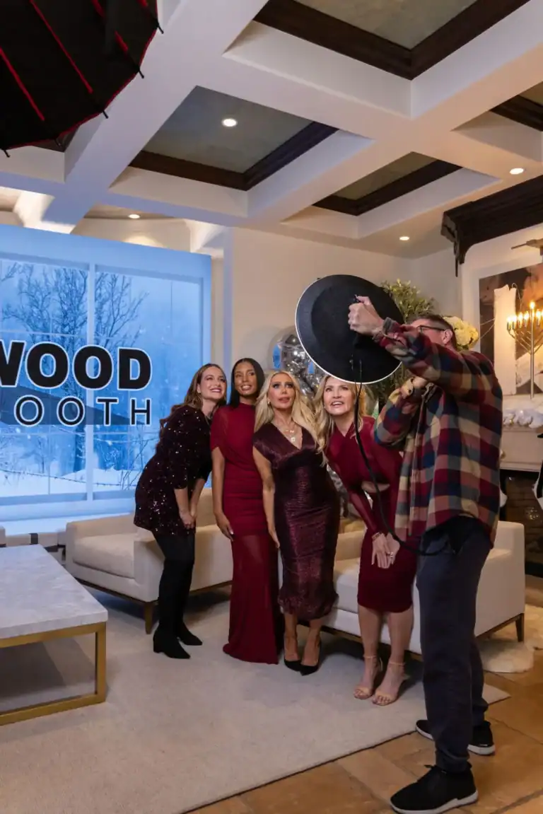 Create polished group portraits indoors with a roaming photo booth that brings studio-style lighting to your event.